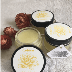 Golden Goddess Salve Made with organic ingredients: Sweet almond oil and beeswax from Volcano Hawaii. With organic essential oils of: Lavender, chamomile, neroli, rose geranium, bergamot. Organic herbs: lavender, chamomile, calendula.